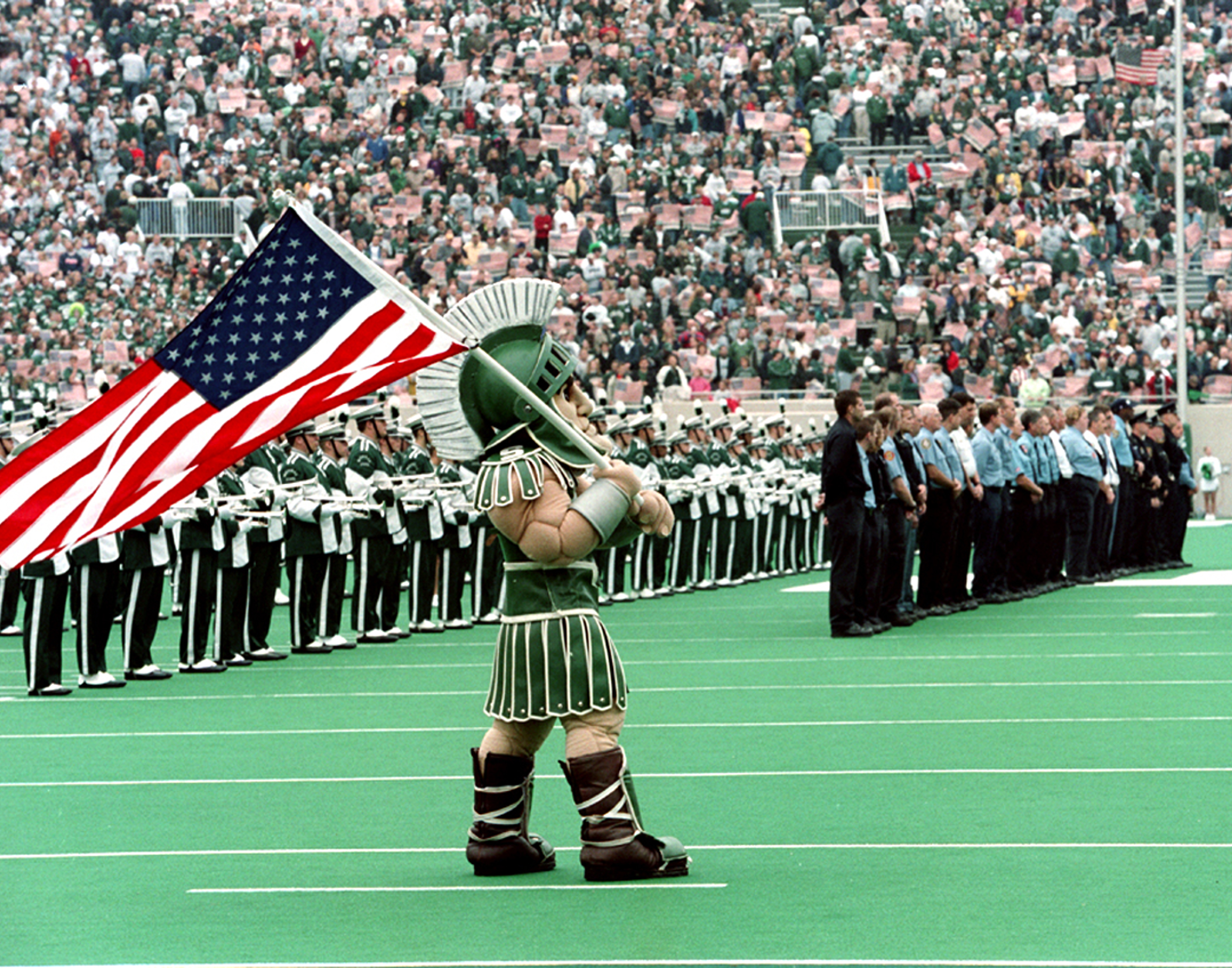 Sparty with a US flag